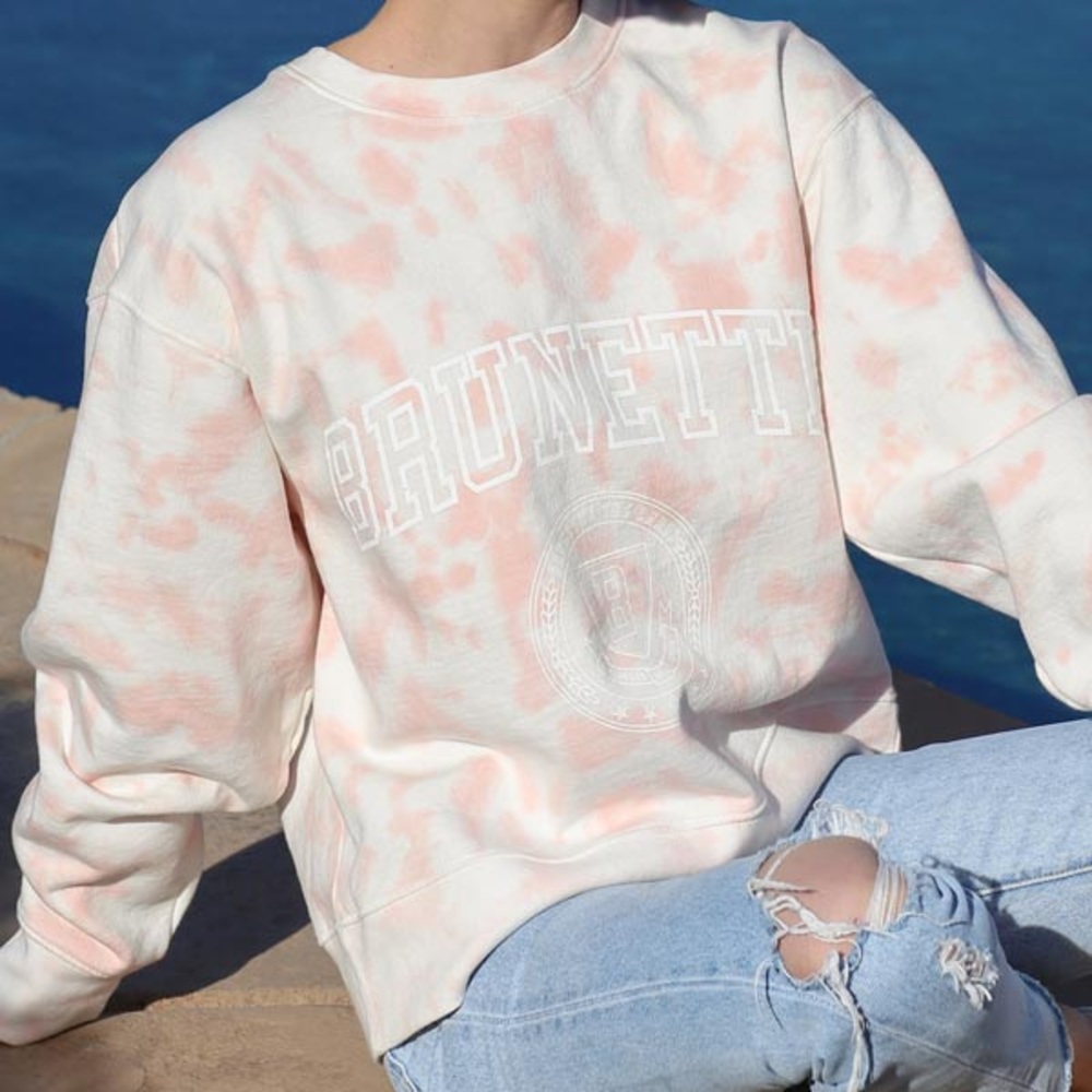 Pink and white tie die Brunette sweatshirt that has Blonde logo on front.